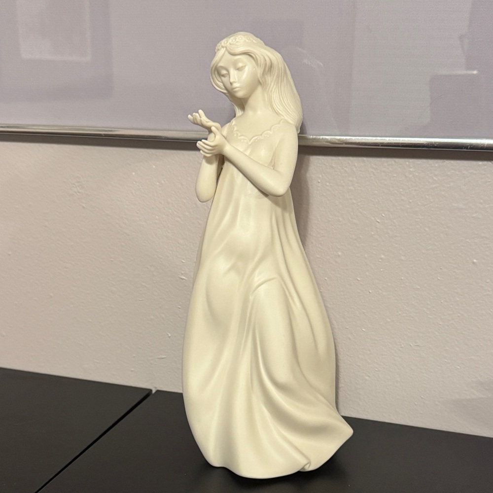 Elegant White Ceramic Figurine